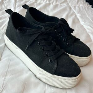 Black platform sneakers